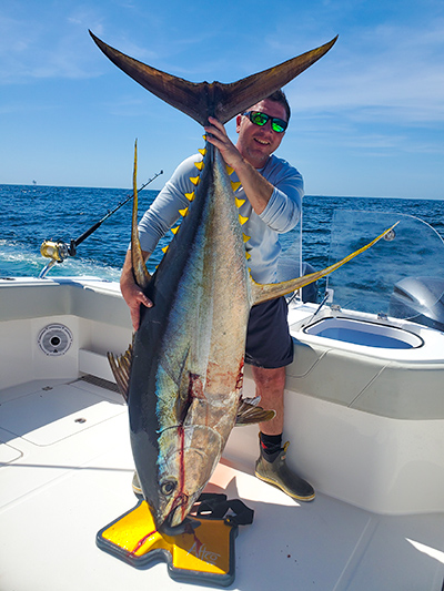 man holding a large fish